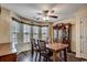 Warm and inviting dining room filled with lots of natural light and neutral walls at 179 Heath Dr., Longs, SC 29568