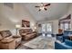 Spacious living room featuring vaulted ceilings, comfortable seating, and ample natural light at 179 Heath Dr., Longs, SC 29568