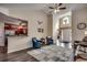 Bright and airy living room with an open floor plan, a connecting kitchen, and stylish decor at 179 Heath Dr., Longs, SC 29568