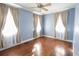 This spacious bedroom offers hardwood floors, three windows, and ample light at 1841 Jasper St., Georgetown, SC 29440