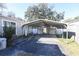 View of large carport adjacent to the house with ample parking space and a secure, covered area at 1841 Jasper St., Georgetown, SC 29440