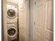 This laundry room features a stacked washer and dryer at 1841 Jasper St., Georgetown, SC 29440