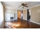 Spacious living room featuring built-in shelving and access to the kitchen and hallway at 1841 Jasper St., Georgetown, SC 29440