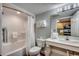 Well-lit bathroom features a shower/tub combo and white vanity at 2006 N Ocean Blvd. # 876, Myrtle Beach, SC 29577