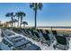 Serene beach access from the property with plenty of lounge chairs at 2006 N Ocean Blvd. # 876, Myrtle Beach, SC 29577