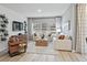 Comfortable living room featuring neutral tones, hardwood floors, and natural light at 2024 Copper Creek Loop, Longs, SC 29568