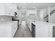 Bright kitchen with white cabinets, stainless steel appliances, and a center island at 2044 Copper Creek Loop, Longs, SC 29568