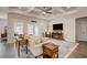 Comfortable living room featuring recessed lighting, coffered ceiling, and ample seating at 221 Portrush Loop, Pawleys Island, SC 29585