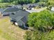 An aerial view captures a beautiful backyard next to a large tree at 227 Old Hickory Dr., Conway, SC 29526
