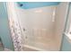 Bathroom featuring a pristine, bright white shower tub and shower curtain at 227 Old Hickory Dr., Conway, SC 29526