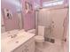 A modern bathroom featuring a glass-enclosed shower, white marble floors, and a clean, white vanity at 227 Old Hickory Dr., Conway, SC 29526