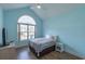 Cozy bedroom with a high ceiling, ceiling fan, and large window at 227 Old Hickory Dr., Conway, SC 29526