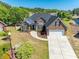 Beautiful aerial view of the brick home showcasing the manicured lawn and established landscaping at 227 Old Hickory Dr., Conway, SC 29526