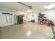 A well-organized garage space with epoxy floors, storage shelves, and ample room for vehicles and other belongings at 227 Old Hickory Dr., Conway, SC 29526