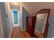 Hallway with wood floors leading to a bedroom at 227 Old Hickory Dr., Conway, SC 29526