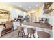 Bright kitchen featuring white cabinets, wood countertops, stainless steel appliances, and bar seating at 227 Old Hickory Dr., Conway, SC 29526