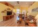 Bright living room with high ceilings, hardwood floors, and comfortable seating creating an inviting space at 227 Old Hickory Dr., Conway, SC 29526