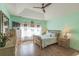 Serene bedroom with a tray ceiling, hardwood floors, and a calming color palette at 227 Old Hickory Dr., Conway, SC 29526