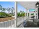 Spacious balcony with outdoor seating and views of the surrounding landscape at 2306 Seaseeker Ln., Myrtle Beach, SC 29577