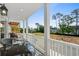Relaxing balcony with outdoor seating and scenic views of trees and the city skyline at 2306 Seaseeker Ln., Myrtle Beach, SC 29577