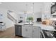 Bright kitchen featuring white cabinets, stainless steel appliances, and open layout at 2306 Seaseeker Ln., Myrtle Beach, SC 29577