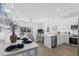 Open concept kitchen and living area with modern appliances and natural light at 2306 Seaseeker Ln., Myrtle Beach, SC 29577
