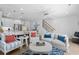 Inviting living room features coastal decor, open floor plan, and bright, natural light at 2306 Seaseeker Ln., Myrtle Beach, SC 29577