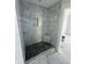 Tiled shower stall with corner seat and a shower niche at 2306 Seaseeker Ln., Myrtle Beach, SC 29577