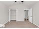 This bedroom offers neutral walls, a large closet, and neutral carpet at 2454 N Windmill Way, Myrtle Beach, SC 29579