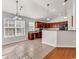 Kitchen with tile floor and stainless steel appliances with eating nook at 2454 N Windmill Way, Myrtle Beach, SC 29579