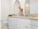 Elegant bathroom with double sink vanity, granite countertops, and decorative mirror at 2602 Blue Crane Circle # 104, Myrtle Beach, SC 29577