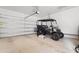 Garage featuring a black golf cart at 2602 Blue Crane Circle # 104, Myrtle Beach, SC 29577