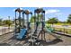 Community playground area featuring slides, climbing structures, and shaded areas at 2602 Blue Crane Circle # 104, Myrtle Beach, SC 29577