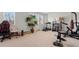 Finished recreation room featuring a treadmill and weights at 2602 Blue Crane Circle # 104, Myrtle Beach, SC 29577