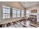 Bright bonus room with many windows looking to the exterior, hardwood floors, and natural light at 269 Leste Rd., Myrtle Beach, SC 29588