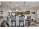 Kitchen with a breakfast bar, pendant lights, bar stools, gray cabinets, and stainless steel appliances at 269 Leste Rd., Myrtle Beach, SC 29588