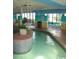 Indoor lazy river with plants and beach themed decor at 2710 N Ocean Blvd. # 308, Myrtle Beach, SC 29577