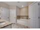 Relaxing bathroom with a soaking tub and a granite topped vanity at 2749 Sanctuary Blvd., Conway, SC 29526