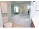 Bathroom featuring a white jacuzzi tub, toilet, tile floors and mirrored walls at 311 Cumberland Terrace Dr. # 7-E, Myrtle Beach, SC 29572