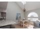 Dining area with white table and a view into the kitchen at 311 Cumberland Terrace Dr. # 7-E, Myrtle Beach, SC 29572