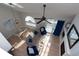 High angle of airy living room showcasing modern furnishings and natural light from the skylight at 311 Cumberland Terrace Dr. # 7-E, Myrtle Beach, SC 29572