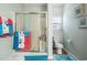 Bathroom with glass shower and a toilet, featuring blue and coral nautical themed towels at 313 Foxpath Loop, Myrtle Beach, SC 29588