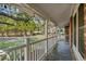 Cozy front porch with a railing, offering a relaxing outdoor space at 315 Oak Dr. N, Surfside Beach, SC 29575