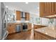 Updated kitchen featuring stainless steel appliances, granite countertops and hardwood floors at 315 Oak Dr. N, Surfside Beach, SC 29575