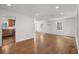 Spacious and bright living room area with hardwood floors adjacent to the kitchen at 315 Oak Dr. N, Surfside Beach, SC 29575