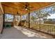 Covered screened porch with wood ceiling, ceiling fans, and view of backyard at 315 Oak Dr. N, Surfside Beach, SC 29575