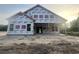 New house with windows and porch during construction phase at 3186 Wayside Rd., Conway, SC 29527