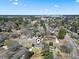 Overhead view of a quiet residential area featuring well-maintained homes and tree-lined streets at 3727 Otter St., Myrtle Beach, SC 29577