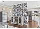 Open-concept kitchen with white cabinets and stainless appliances adjacent to the dining area at 3727 Otter St., Myrtle Beach, SC 29577