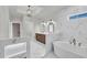 Luxurious bathroom with double vanity, soaking tub, and marble tile shower at 373 St. Julian Ln., Myrtle Beach, SC 29579